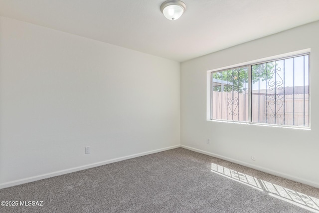 8341 E Placita Prado, Tucson, AZ 85710 - carpeted empty room featuring baseboards
