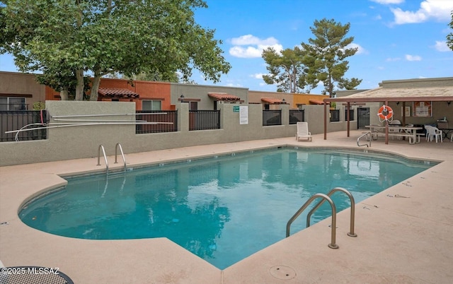 8341 E Placita Prado, Tucson, AZ 85710 - community pool with a patio area
