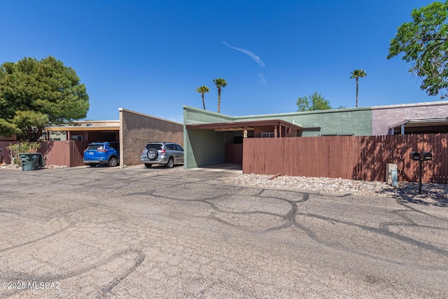 8341 E Placita Prado, Tucson, AZ 85710 - view of front of house featuring uncovered parking and stucco siding