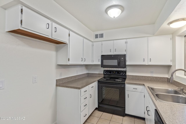 8341 E Placita Prado, Tucson, AZ 85710 - kitchen featuring black appliances, a sink, and white cabinetry