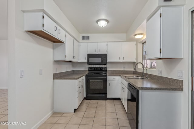 8341 E Placita Prado, Tucson, AZ 85710 - kitchen with black appliances, a sink, dark countertops, and light tile patterned flooring