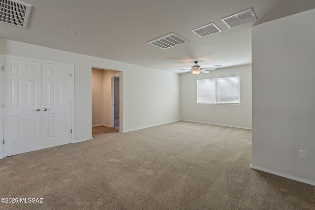 interior space featuring visible vents and carpet
