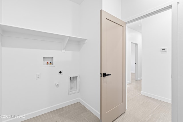 laundry area with electric dryer hookup, baseboards, laundry area, and hookup for a washing machine