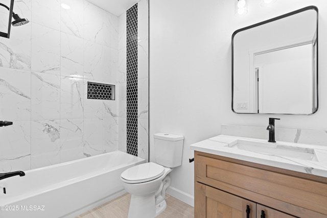 full bathroom with shower / bathing tub combination, baseboards, vanity, and toilet
