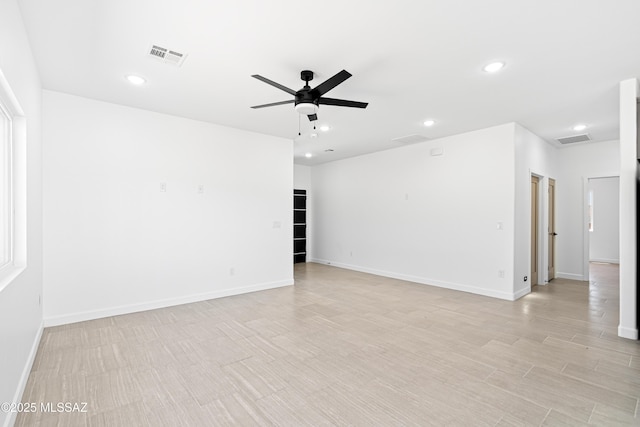 unfurnished room featuring recessed lighting, visible vents, and a ceiling fan