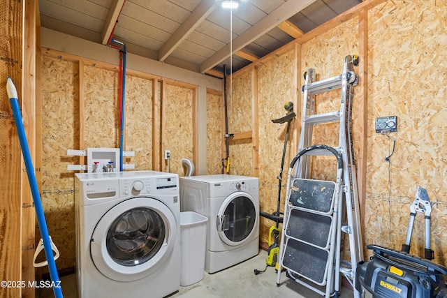 clothes washing area with laundry area and independent washer and dryer