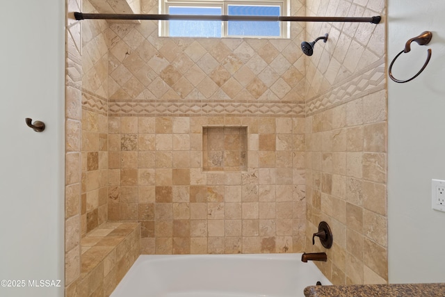 bathroom with shower / washtub combination
