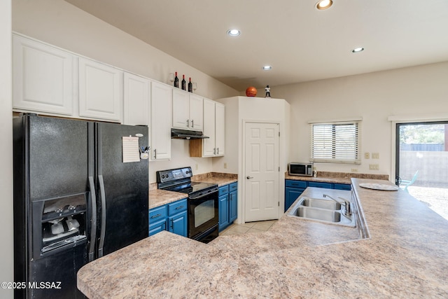 1320 S Via Estrella Roja, Tucson, AZ 85713 - kitchen with black appliances, a sink, blue cabinets, white cabinets, and recessed lighting