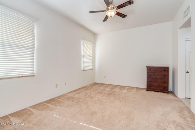 1320 S Via Estrella Roja, Tucson, AZ 85713 - unfurnished bedroom featuring carpet floors and ceiling fan