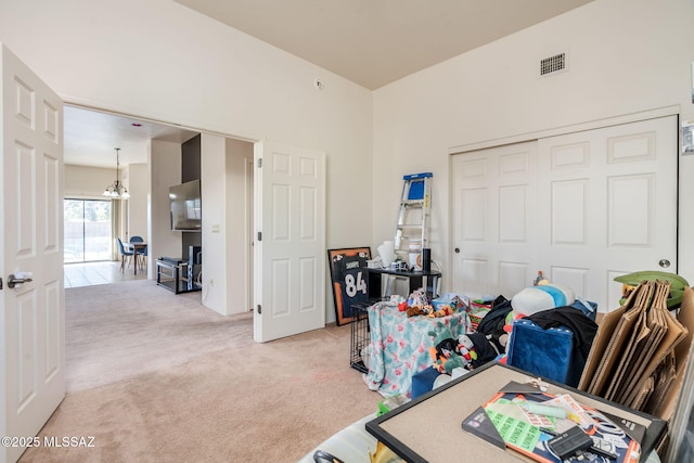 1320 S Via Estrella Roja, Tucson, AZ 85713 - home office with light carpet and a chandelier
