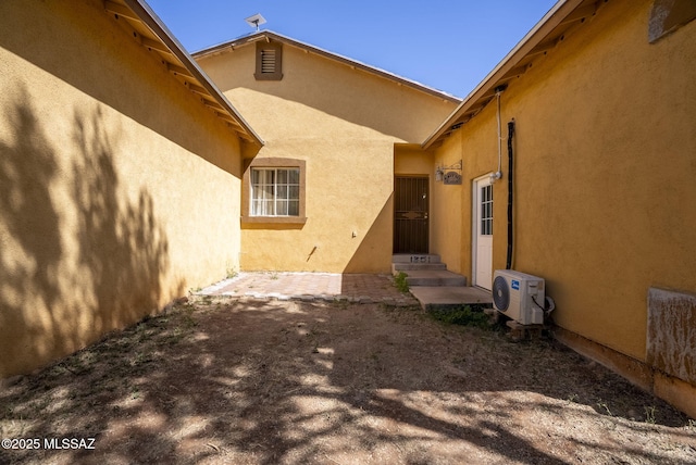 1351 Alma Ct, Rio Rico, AZ 85648 - exterior space with stucco siding and ac unit