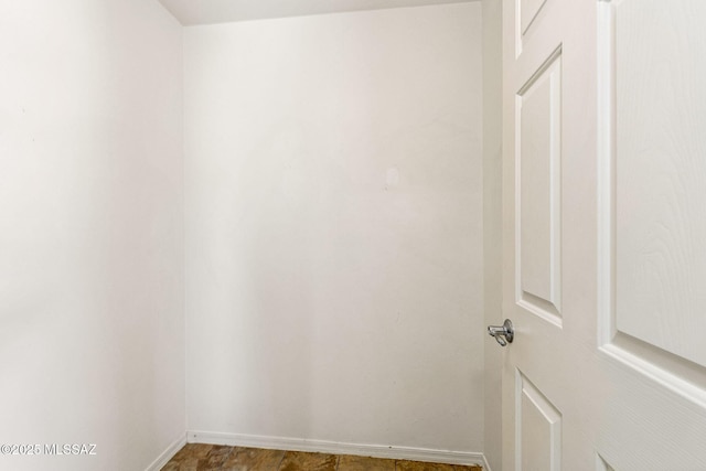 interior space with baseboards