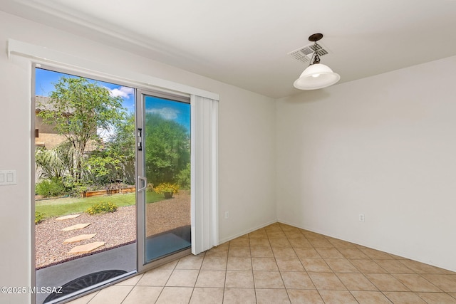 interior space with visible vents and light tile patterned floors