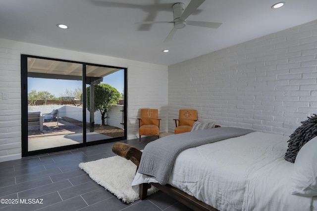1720 W Cessna Way, Tucson, AZ 85755 - bedroom featuring access to outside, dark tile patterned floors, recessed lighting, brick wall, and a ceiling fan