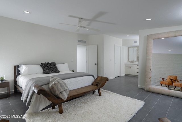 1720 W Cessna Way, Tucson, AZ 85755 - bedroom with recessed lighting, a sink, a ceiling fan, dark tile patterned flooring, and baseboards