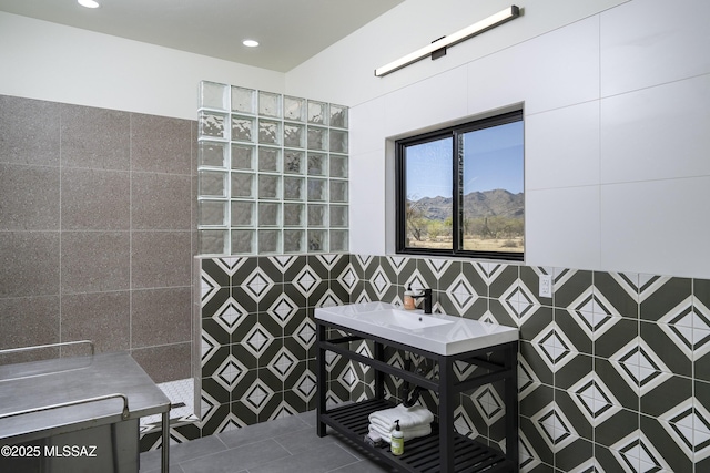 1720 W Cessna Way, Tucson, AZ 85755 - bathroom with tile walls, walk in shower, tile patterned flooring, and recessed lighting