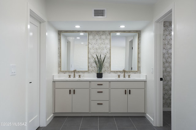1720 W Cessna Way, Tucson, AZ 85755 - bathroom featuring tile patterned floors, double vanity, and baseboards