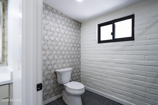 1720 W Cessna Way, Tucson, AZ 85755 - bathroom featuring tile patterned flooring, toilet, baseboards, wallpapered walls, and vanity