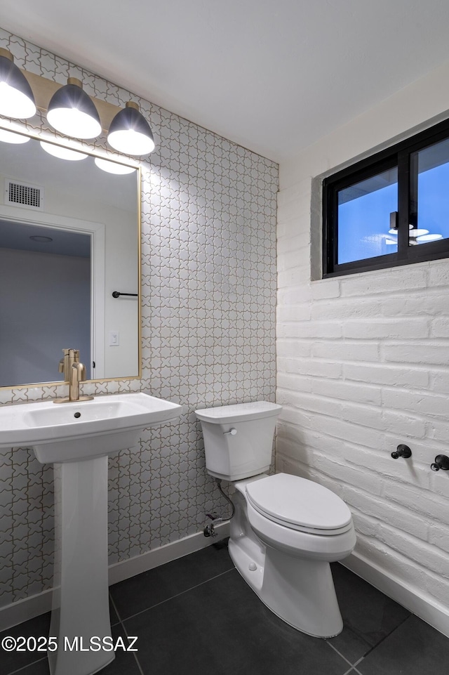 1720 W Cessna Way, Tucson, AZ 85755 - half bath featuring tile patterned flooring, toilet, and baseboards