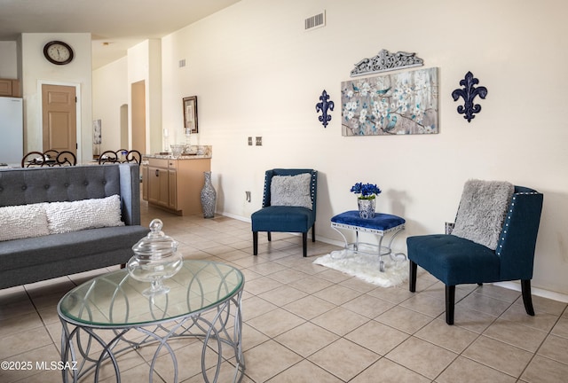 5314 W Canyon Towhee St, Tucson, AZ 85742 - living room with light tile patterned floors and baseboards