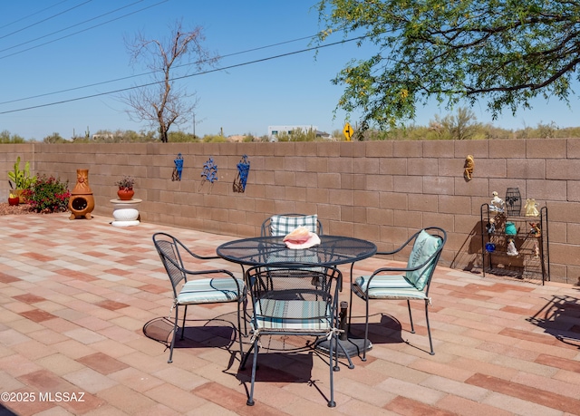 view of patio / terrace with fence