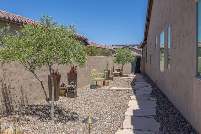 view of yard featuring a fenced backyard