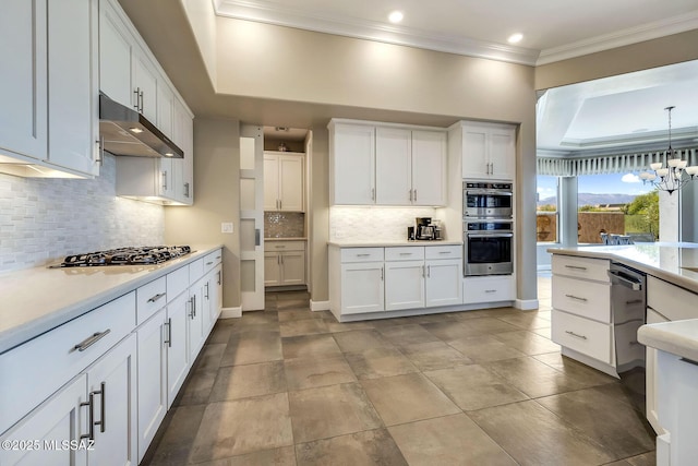 kitchen featuring stainless steel appliances, under cabinet range hood, backsplash, light countertops, and white cabinets