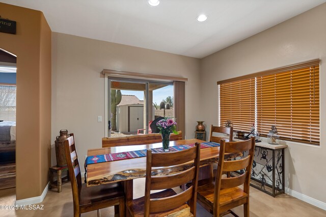 12489 N Owl Head Canyon Rd, Marana, AZ 85658 - dining space with baseboards and recessed lighting
