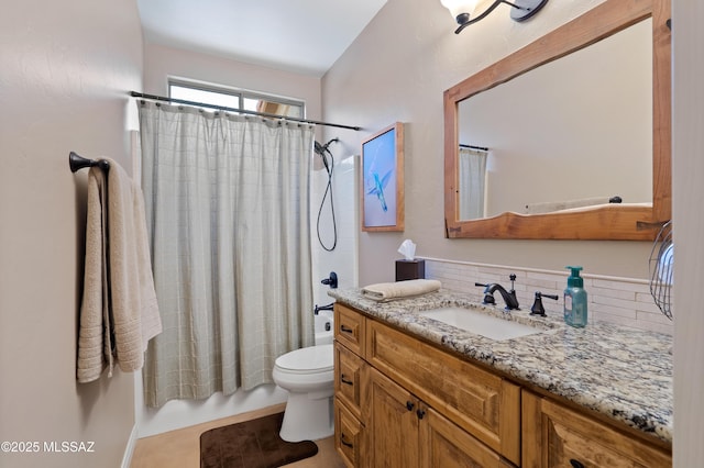 12489 N Owl Head Canyon Rd, Marana, AZ 85658 - full bath featuring vanity, shower / tub combo, toilet, and tasteful backsplash