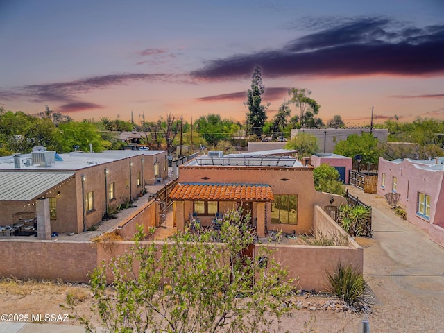 2716 E 6th St, Tucson, AZ 85716 - view of front facade with stucco siding and a tile roof
