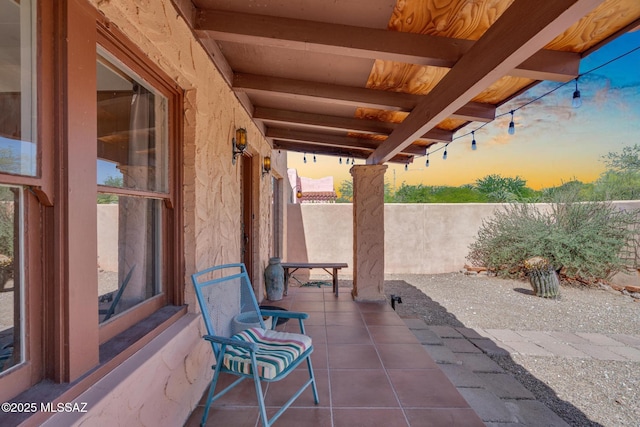 2716 E 6th St, Tucson, AZ 85716 - patio terrace at dusk featuring a patio