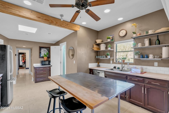2716 E 6th St, Tucson, AZ 85716 - kitchen with stainless steel appliances, a sink, open shelves, recessed lighting, and ceiling fan