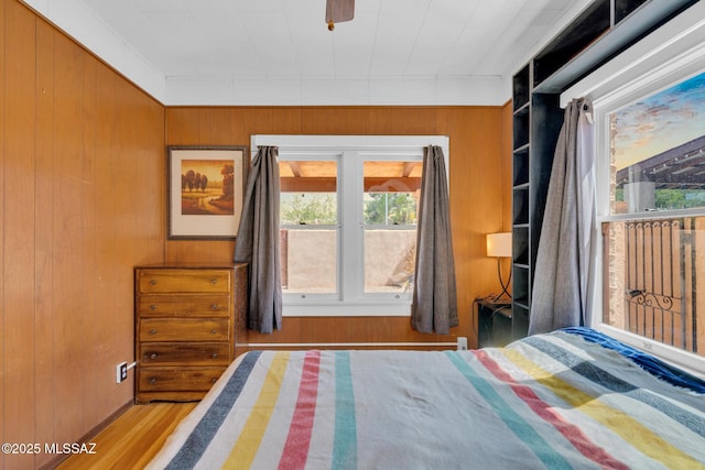 2716 E 6th St, Tucson, AZ 85716 - bedroom with wood walls and wood finished floors