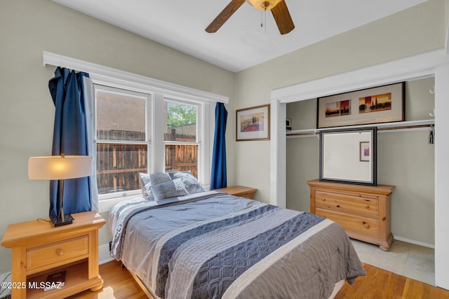 2716 E 6th St, Tucson, AZ 85716 - bedroom featuring wood finished floors, a ceiling fan, and a closet