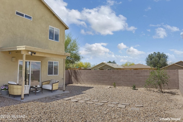 891 E Emma Maria St, Tucson, AZ 85706 - view of yard featuring a patio area and a fenced backyard