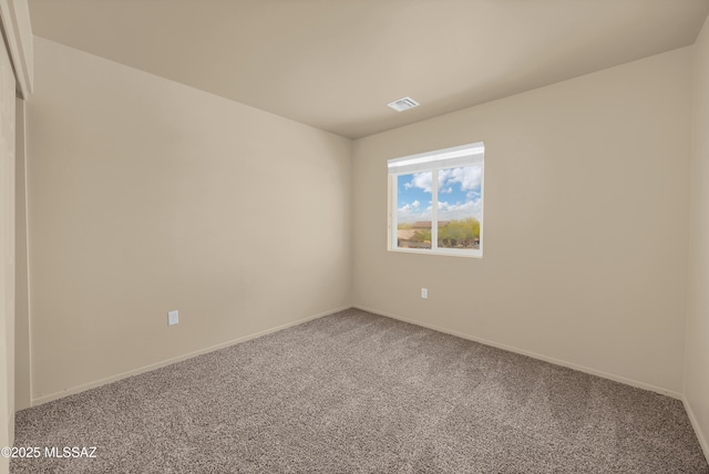 891 E Emma Maria St, Tucson, AZ 85706 - empty room featuring baseboards, visible vents, and carpet floors