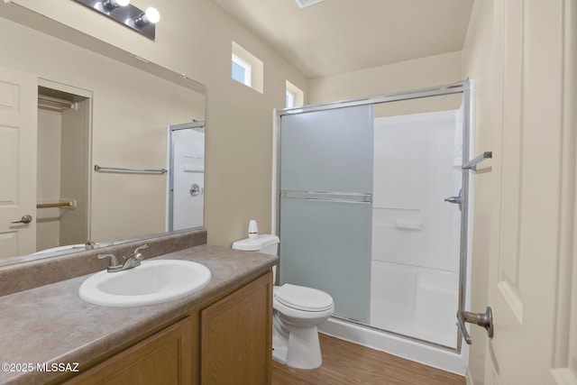 891 E Emma Maria St, Tucson, AZ 85706 - full bath featuring wood finished floors, an enclosed shower, toilet, and vanity