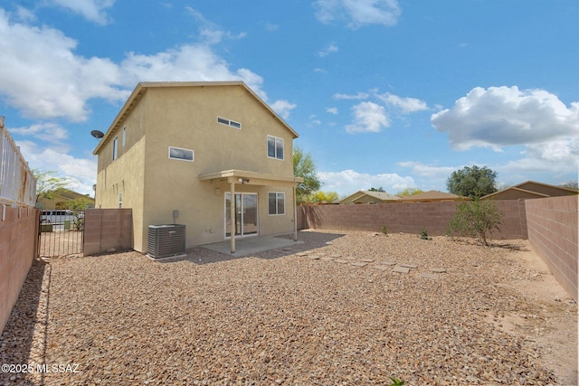 891 E Emma Maria St, Tucson, AZ 85706 - back of house featuring stucco siding, a patio, a fenced backyard, and central AC unit