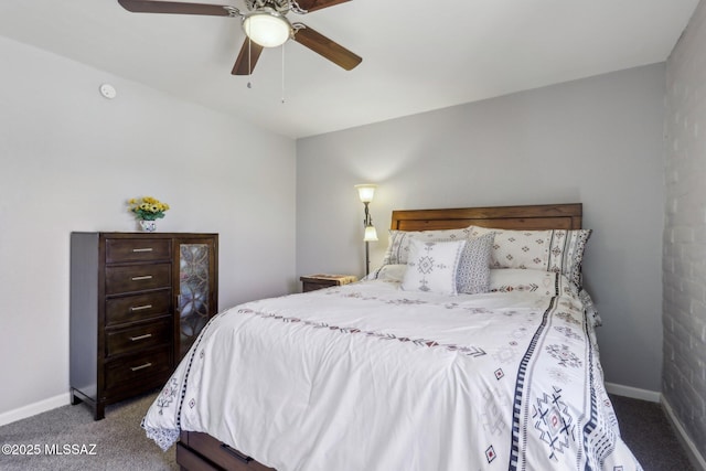 carpeted bedroom featuring a ceiling fan and baseboards