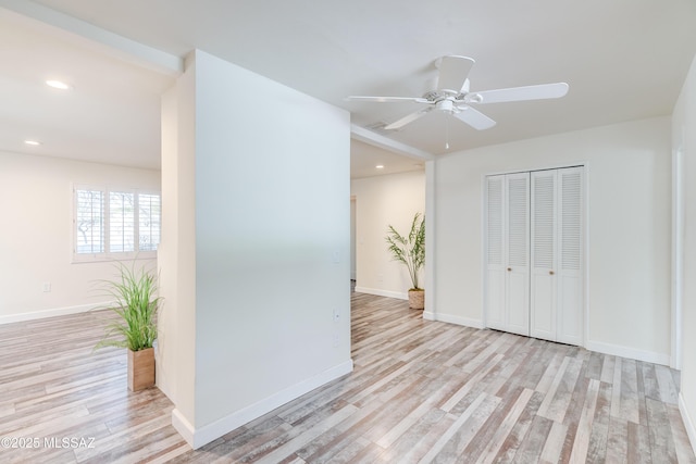 38 N Irving Ave, Tucson, AZ 85711 - unfurnished bedroom with recessed lighting, a ceiling fan, a closet, baseboards, and light wood-style flooring