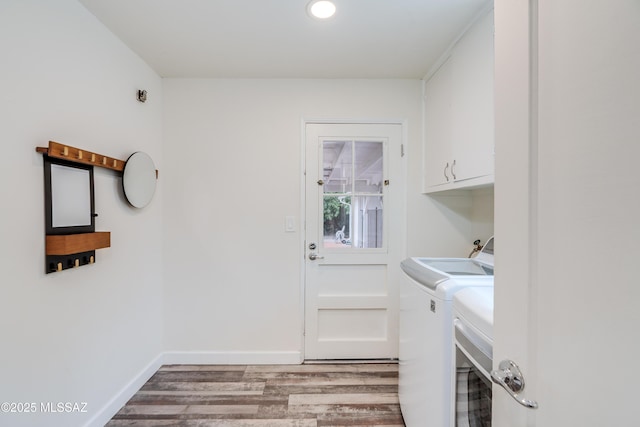 38 N Irving Ave, Tucson, AZ 85711 - washroom with wood finished floors, cabinet space, washing machine and dryer, baseboards, and recessed lighting