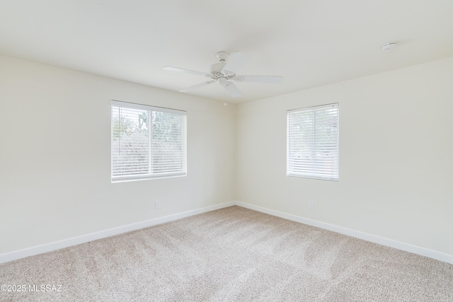 38 N Irving Ave, Tucson, AZ 85711 - empty room featuring carpet, baseboards, and ceiling fan