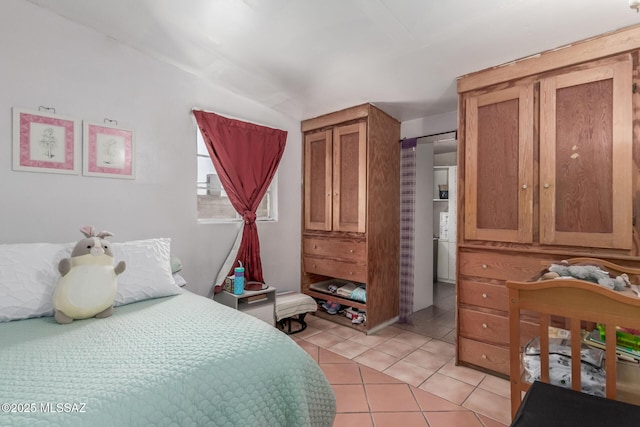414 E 34th St, Tucson, AZ 85713 - bedroom with light tile patterned floors and lofted ceiling