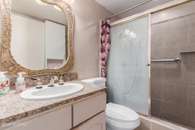 414 E 34th St, Tucson, AZ 85713 - full bathroom with vanity, a shower stall, and toilet