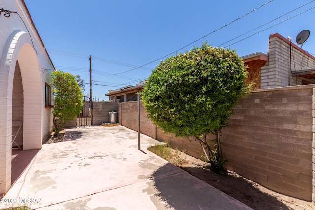414 E 34th St, Tucson, AZ 85713 - view of patio with a gate and fence