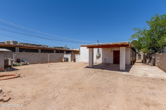 414 E 34th St, Tucson, AZ 85713 - view of yard featuring a patio and a fenced backyard