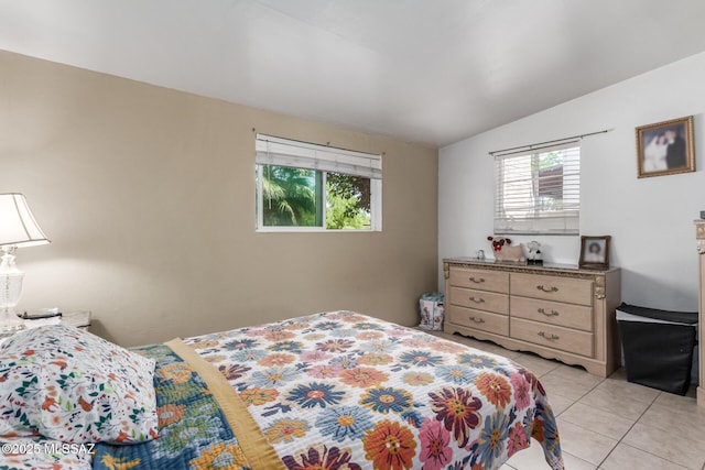 414 E 34th St, Tucson, AZ 85713 - bedroom featuring light tile patterned floors and vaulted ceiling