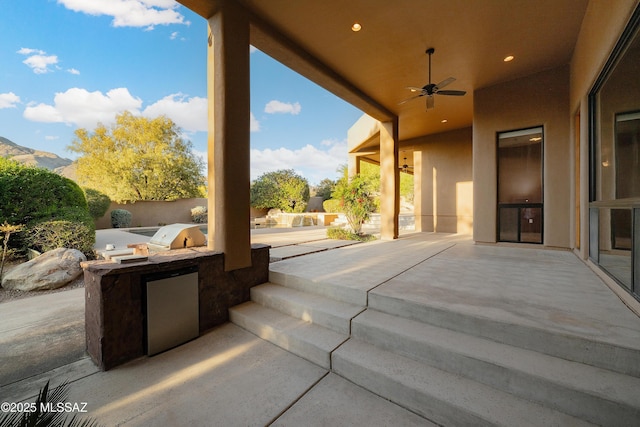 5327 N Ventana Overlook Pl, Tucson, AZ 85750 - view of patio / terrace with an outdoor kitchen, a ceiling fan, and area for grilling