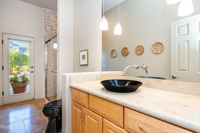 5327 N Ventana Overlook Pl, Tucson, AZ 85750 - full bathroom with an enclosed shower, vanity, and tile patterned flooring