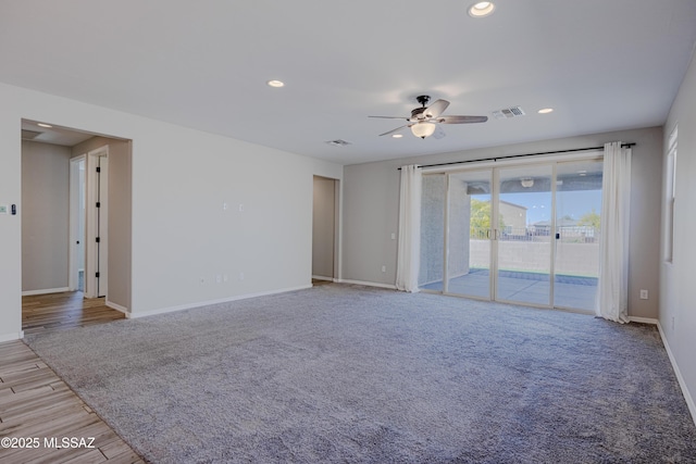unfurnished room with baseboards, ceiling fan, recessed lighting, and visible vents
